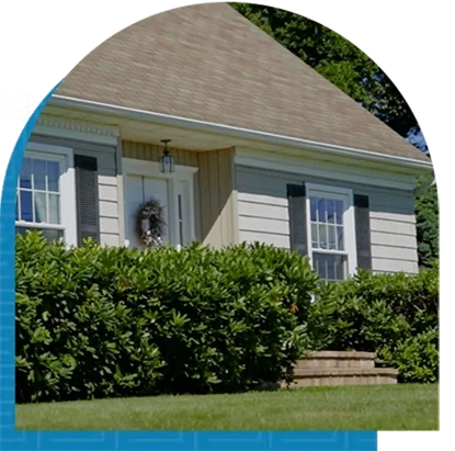 A single-family home with a front lawn and porch